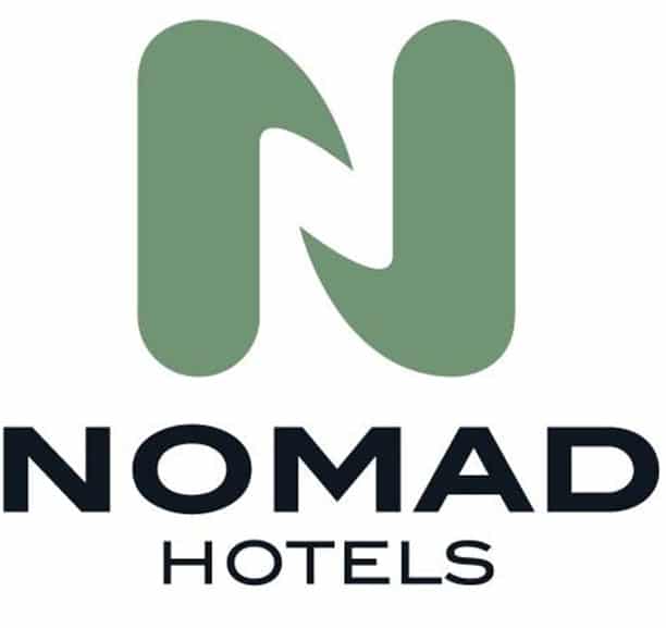 Logo pour Nomad Hotels, une marque de K2 CORP, comportant un « N » vert stylisé au-dessus des mots « NOMAD HOTELS » en lettres majuscules noires en gras.